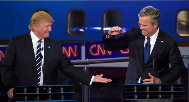Republican presidential candidate, businessman Donald Trump, left, and Jeb Bush slap hands near the finish of the CNN Republican presidential debate at the Ronald Reagan Presidential Library and Museum on Wednesday, Sept. 16, 2015, in Simi Valley, Calif. (AP Photo/Mark J. Terrill)